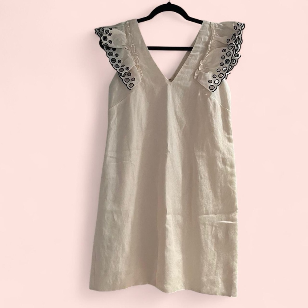 Elegant Cream Dress with Black Accents